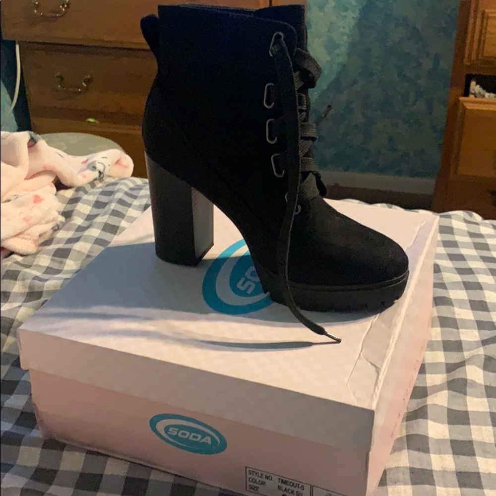 Black high heeled boots